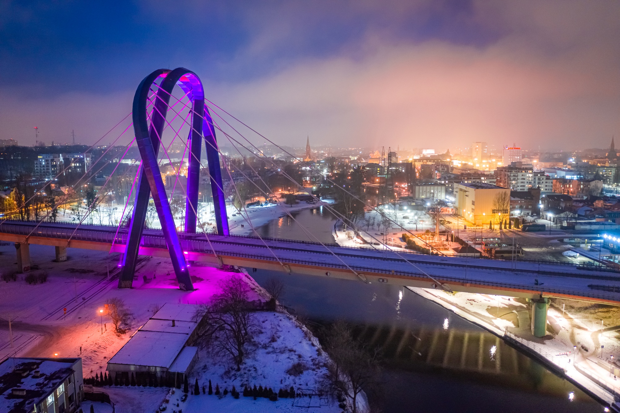 Bridge over Brda river by night. University Route in Bydgoszcz.