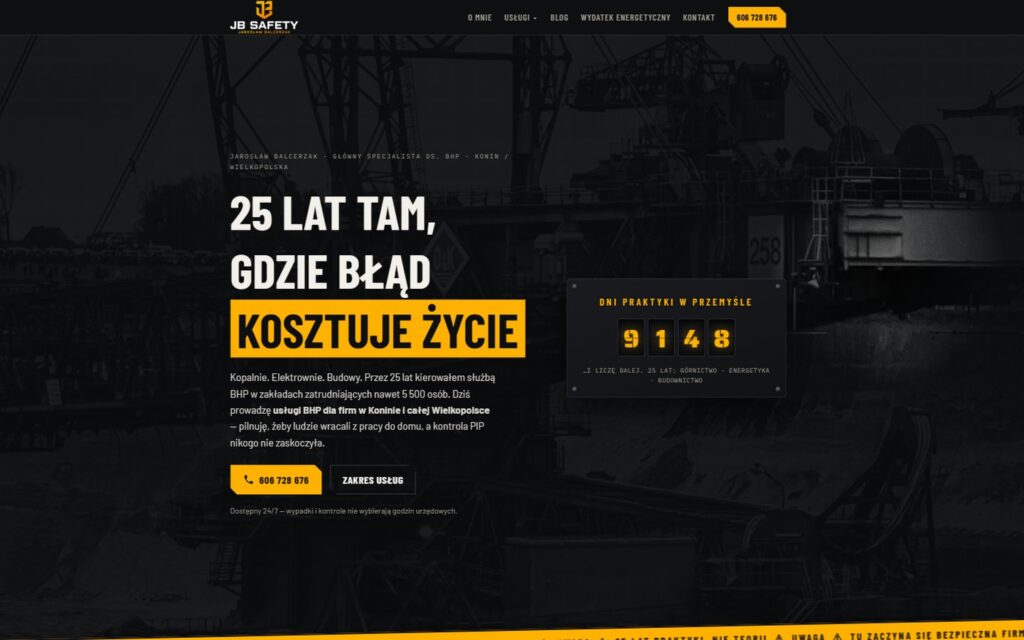Strona jbsafety.pl: ciemny nagłówek z hasłem o 25 latach praktyki BHP